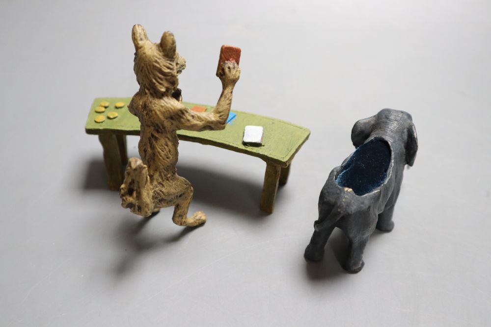 A Bergman style cold painted bronze comical fox playing at a table, indistinctly signed, width 10.5cm and a cold painted bronze elephan